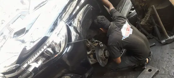 Brake work on a pickup with the wheel removed