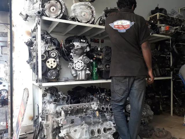 Engines lined up on a shelf at the Al-Rafay workshop